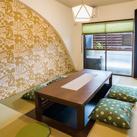 Bijou Suites Kakomi Osaka Bagian luar foto