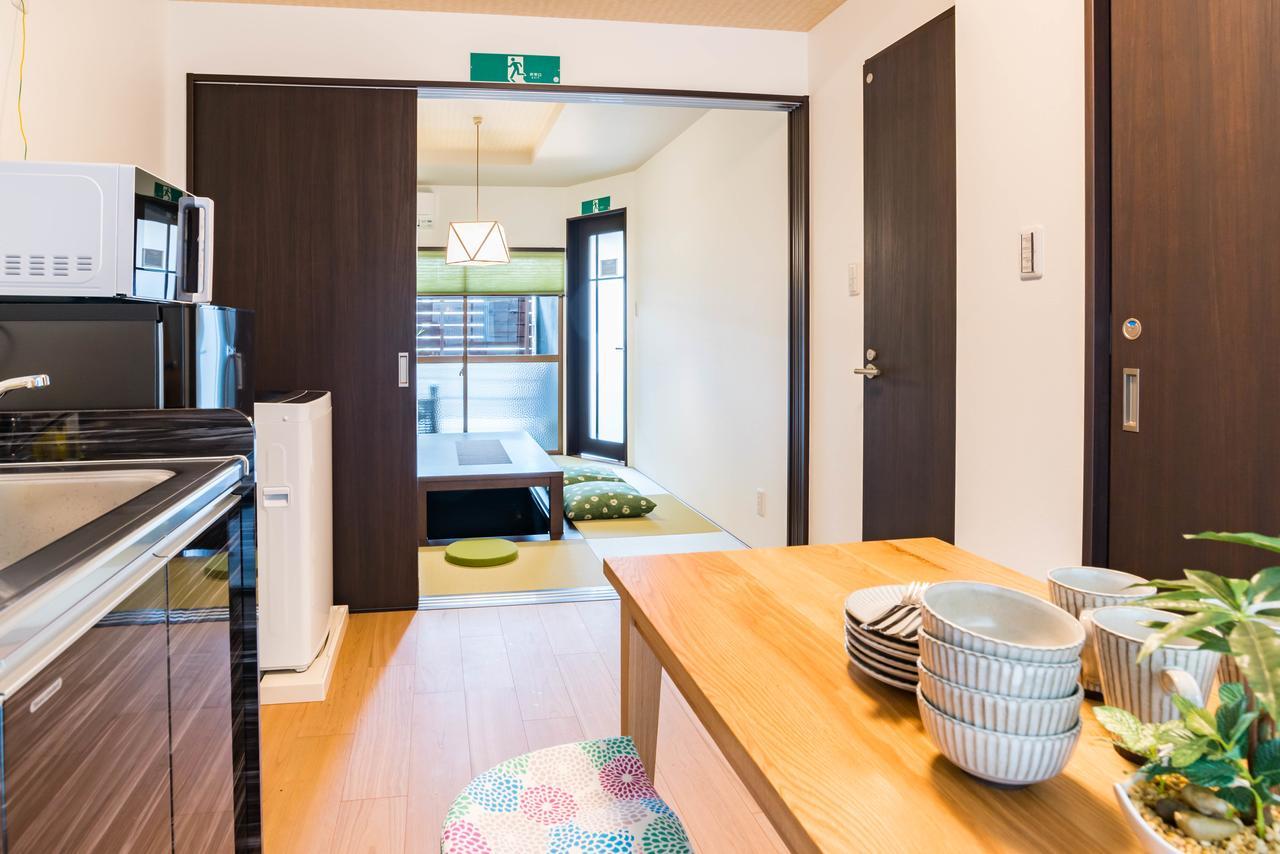 Bijou Suites Kakomi Osaka Bagian luar foto