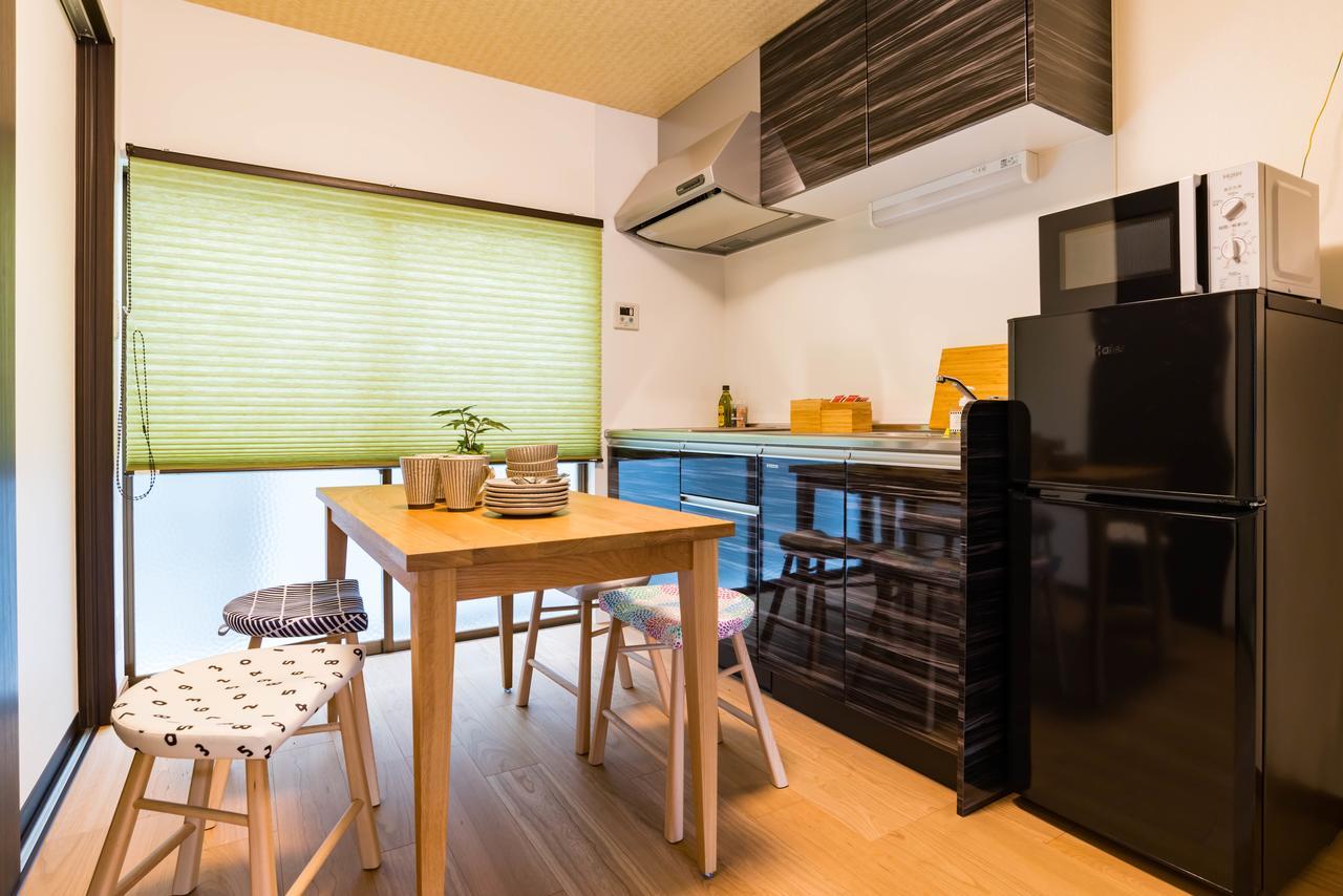 Bijou Suites Kakomi Osaka Bagian luar foto
