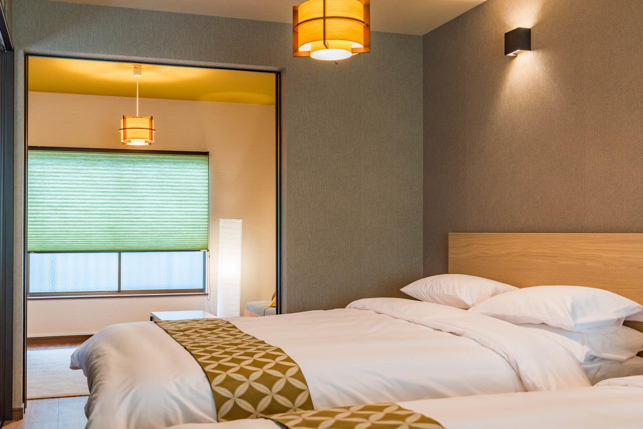 Bijou Suites Kakomi Osaka Bagian luar foto
